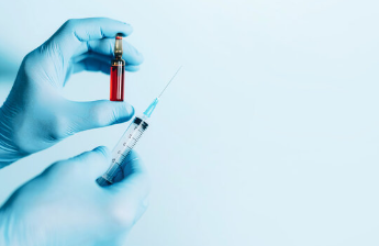 MIC and lipotropic B12 injection vials next to a doctor guided weight loss plan